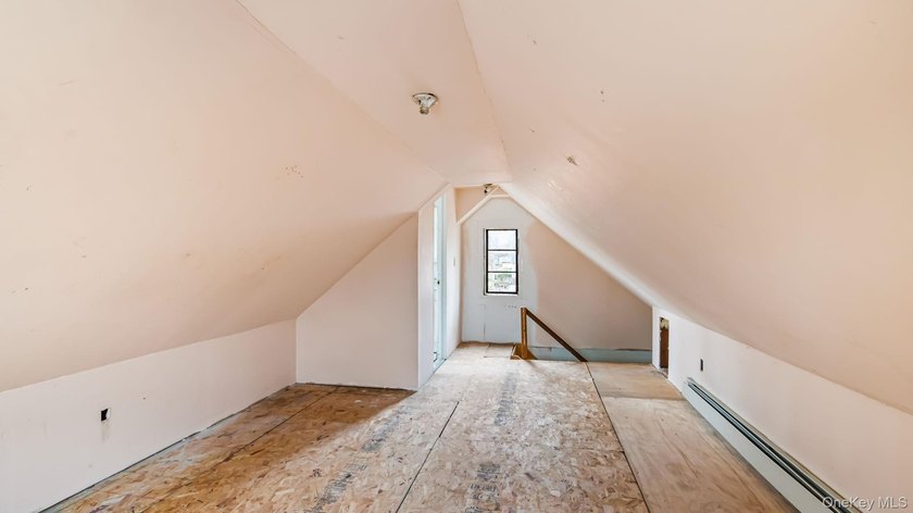 This spacious corner property nestled on a estimated half-acre - photo 31