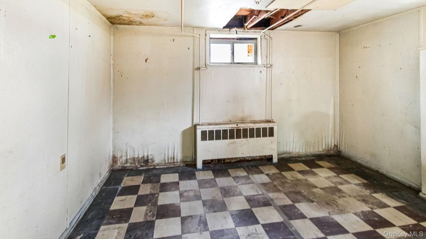 This spacious corner property nestled on a estimated half-acre - photo 33