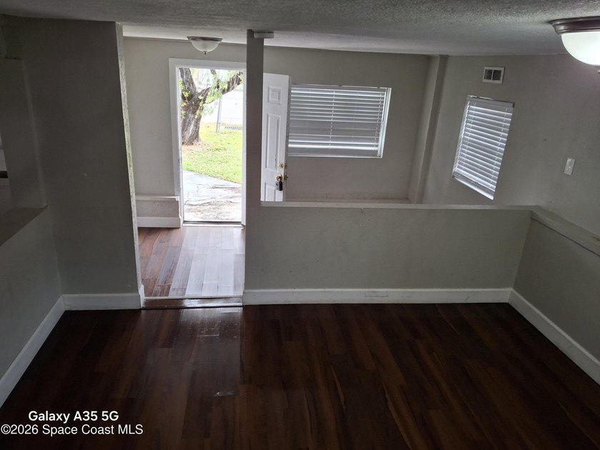 Discover a welcoming SE Palm Bay home that blends comfort - photo 6