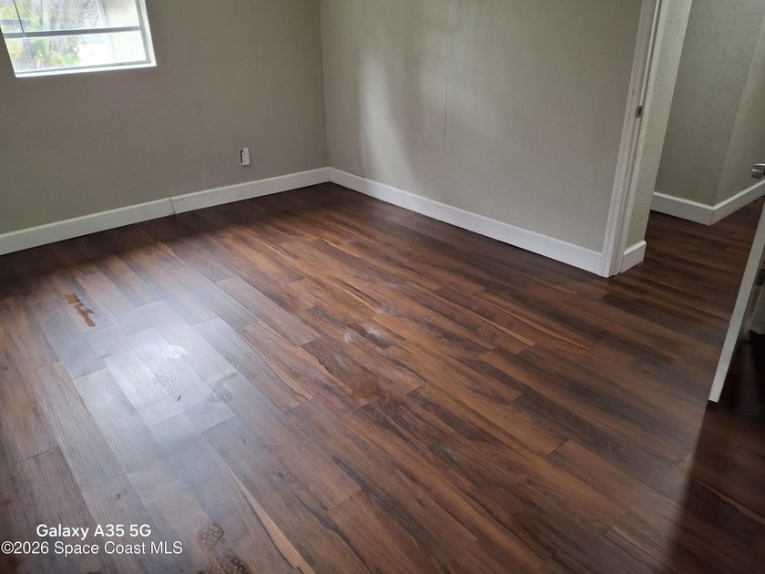 Discover a welcoming SE Palm Bay home that blends comfort - photo 8