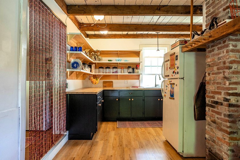 Humming with happiness, this year-round cottage-style home - photo 6