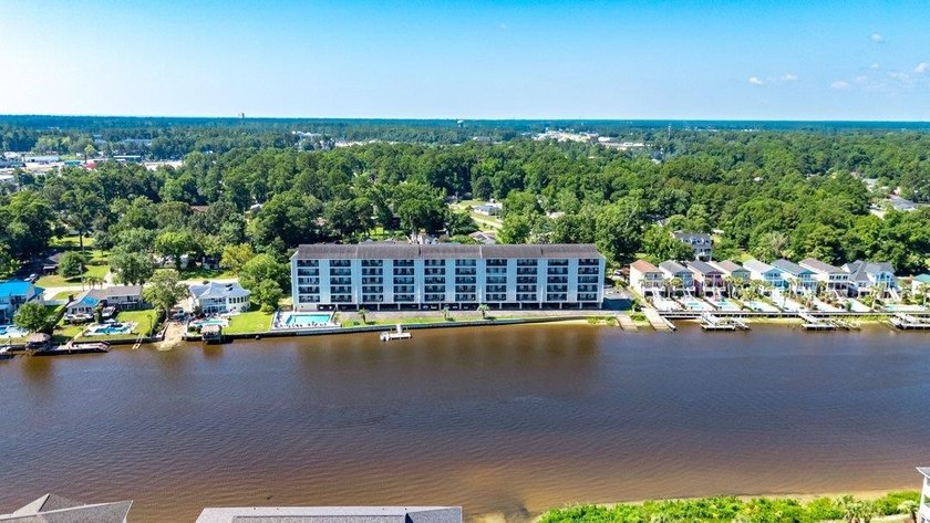 Waterfront luxury meets pristine modern design in this - photo 23