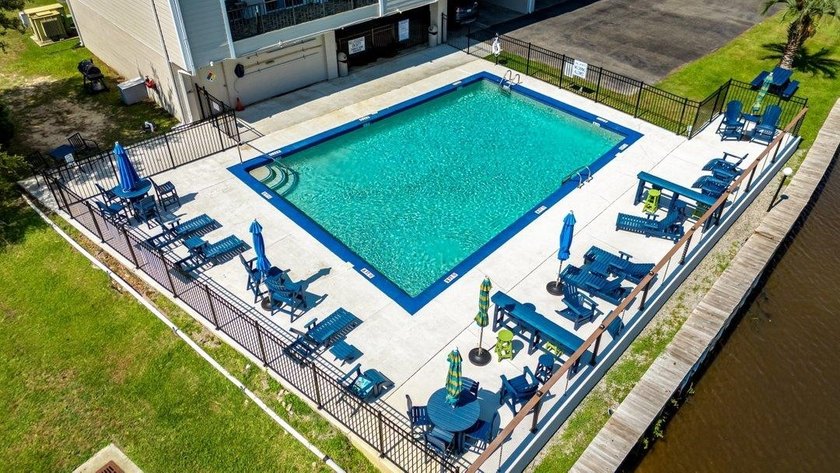 Waterfront luxury meets pristine modern design in this - photo 29