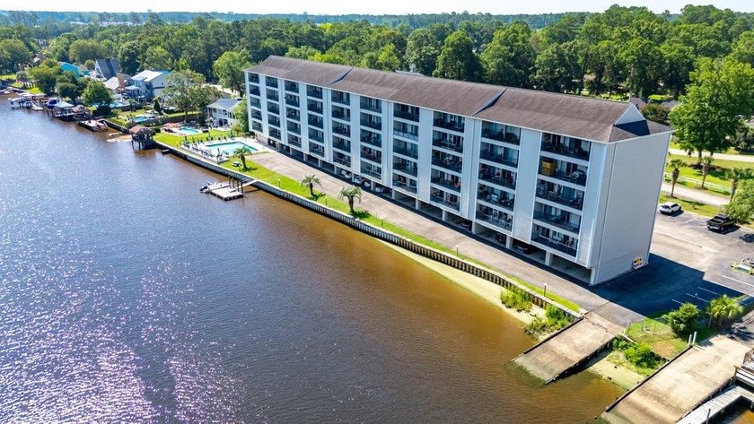 Waterfront luxury meets pristine modern design in this - photo 31