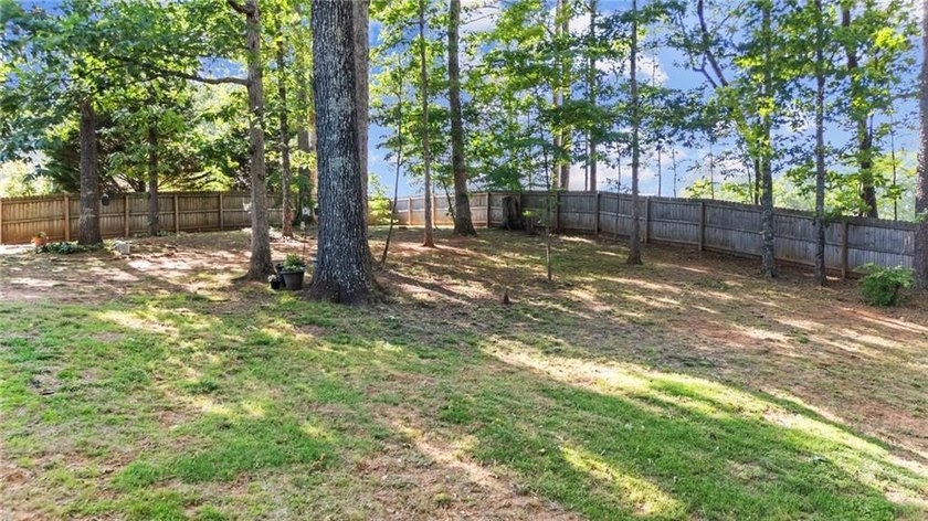 Welcome to 1086 Fieldstone Drive, an inviting ranch home in the - photo 44