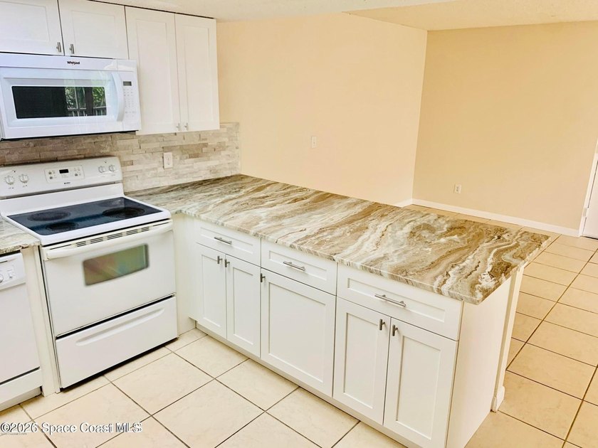 Experience comfort and convenience in this beautifully - photo 6