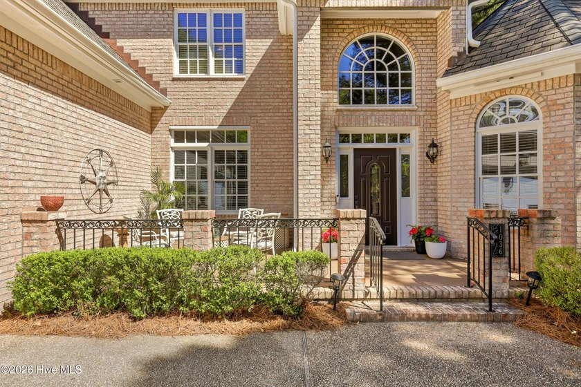 Set within the prestigious community of Landfall, this elegant - photo 6