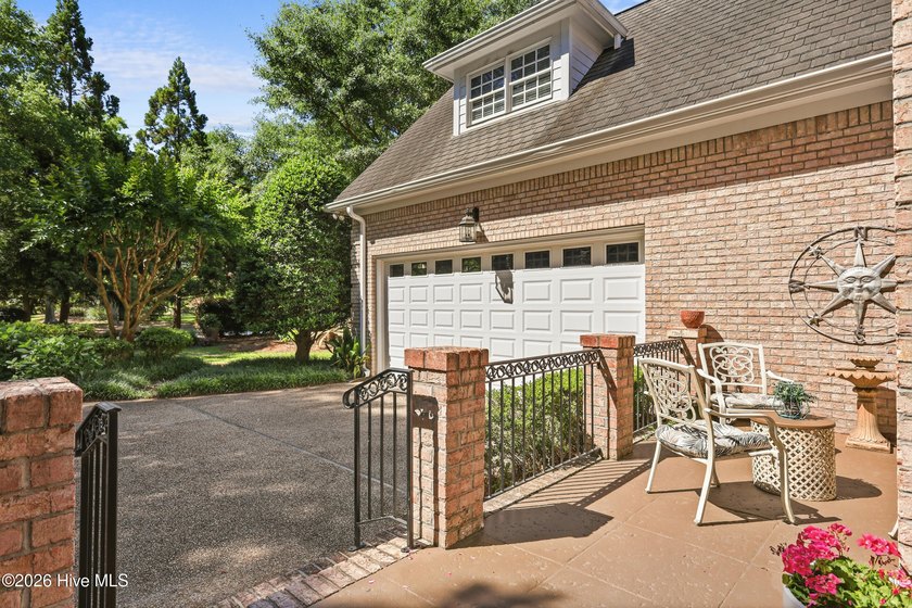 Set within the prestigious community of Landfall, this elegant - photo 7