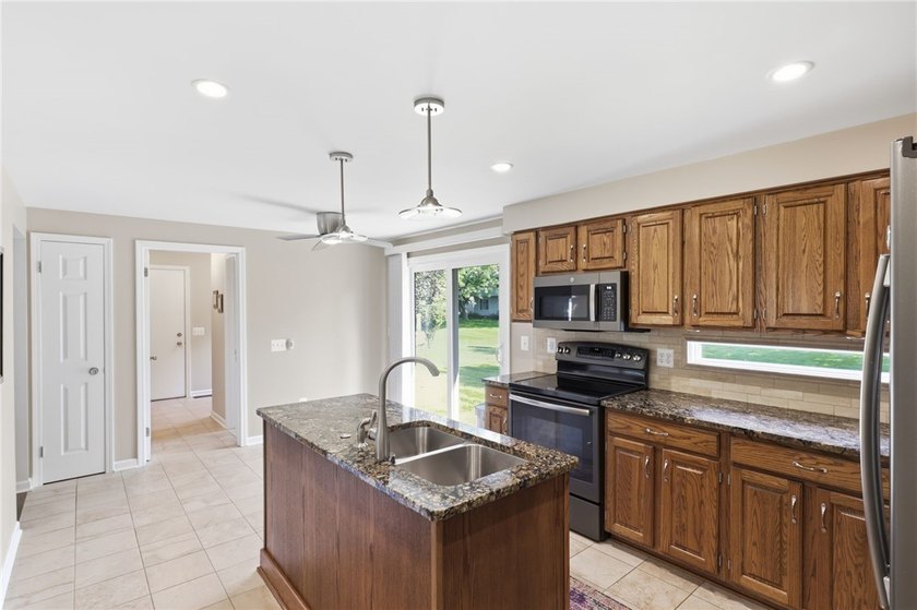 Welcome to 176 Wood Run in Rochester, NY 14612! Proudly offered - photo 13