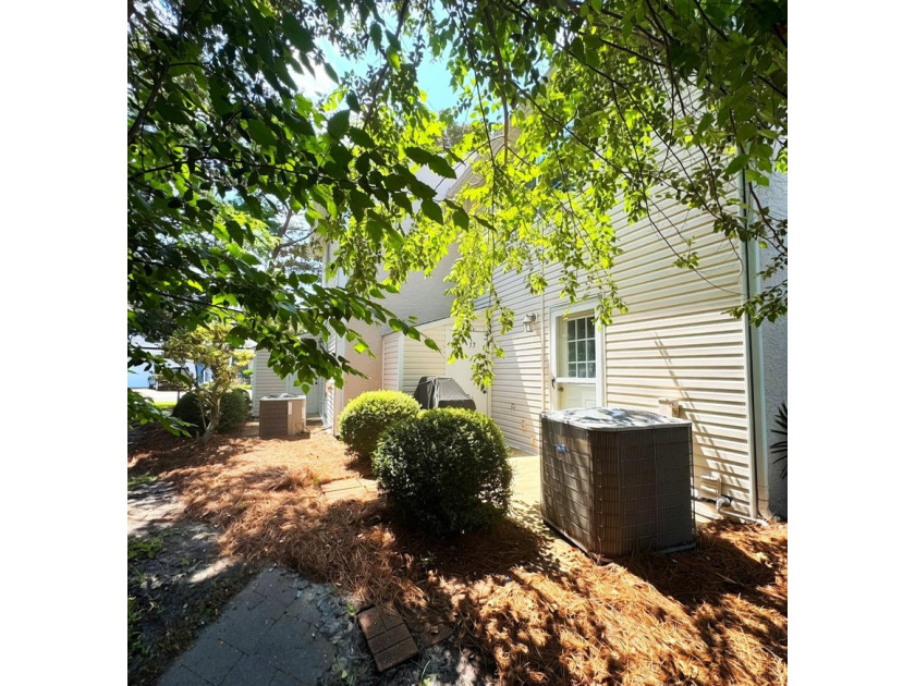 Walk to the beach from this charming 2-bedroom, 2.5-bath - photo 31