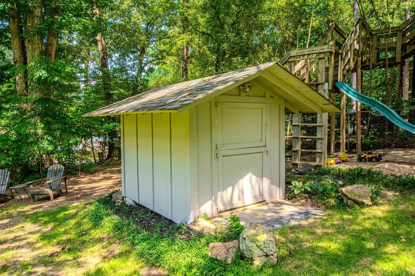 This Beautiful home sits on 2 manicured city lots with small - photo 46