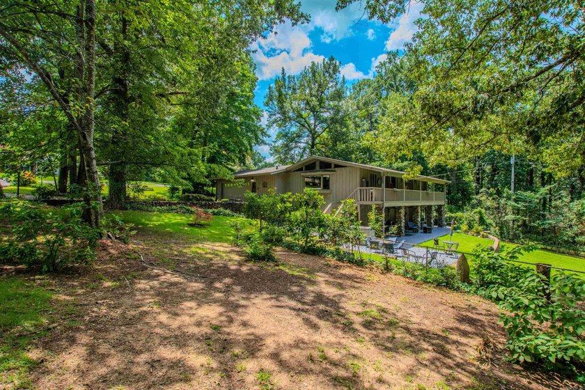 This Beautiful home sits on 2 manicured city lots with small - photo 50