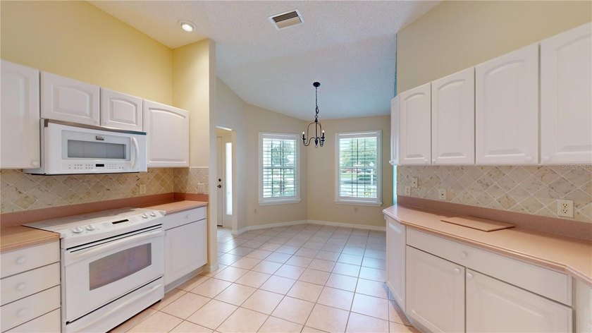 Welcome to this beautifully maintained gas home tucked away on a - photo 3