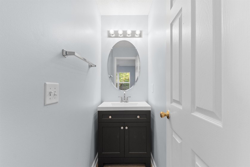 This spacious townhome features three bedrooms, two full baths - photo 15