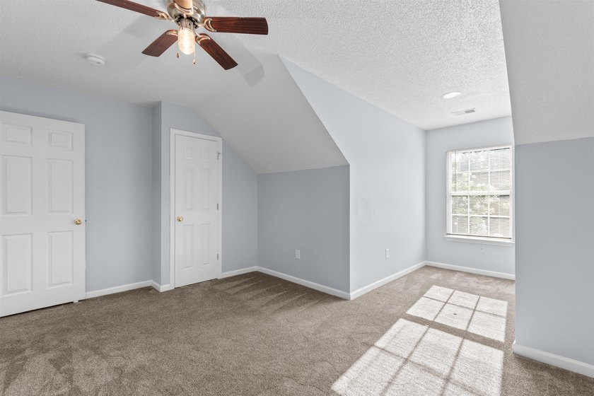 This spacious townhome features three bedrooms, two full baths - photo 24
