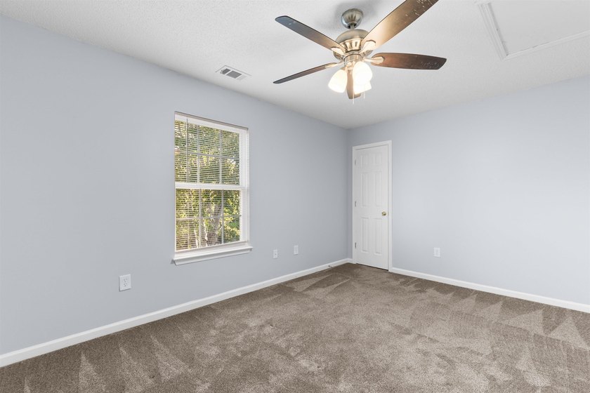 This spacious townhome features three bedrooms, two full baths - photo 26