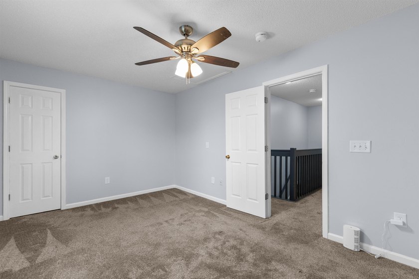 This spacious townhome features three bedrooms, two full baths - photo 28