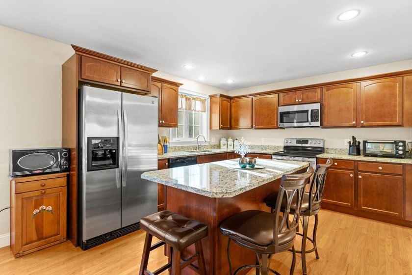 Welcome to 10 Pacific Drive, set on a quiet cul-de-sac and - photo 3