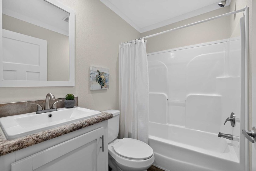Welcome home to this stunning **brand-new 3-bedroom, 2-bath - photo 13