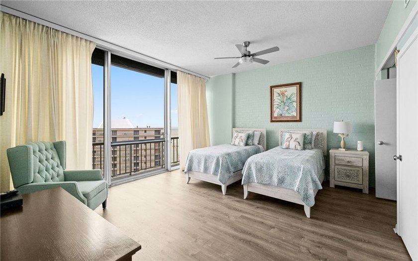 Wake up to sweeping ocean views from this beautifully refreshed - photo 15