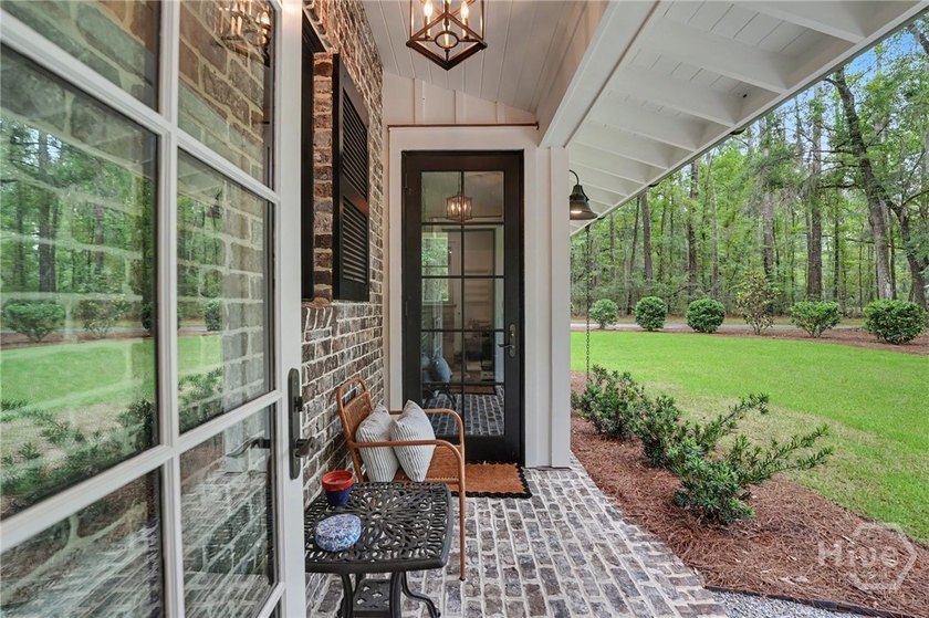 Tucked beneath a canopy of majestic live oaks draped in Spanish - photo 47