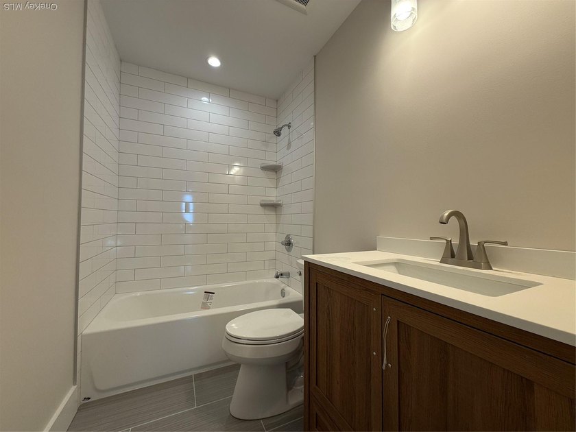 Brand-new custom Cape Cod home offering East End living with a - photo 15