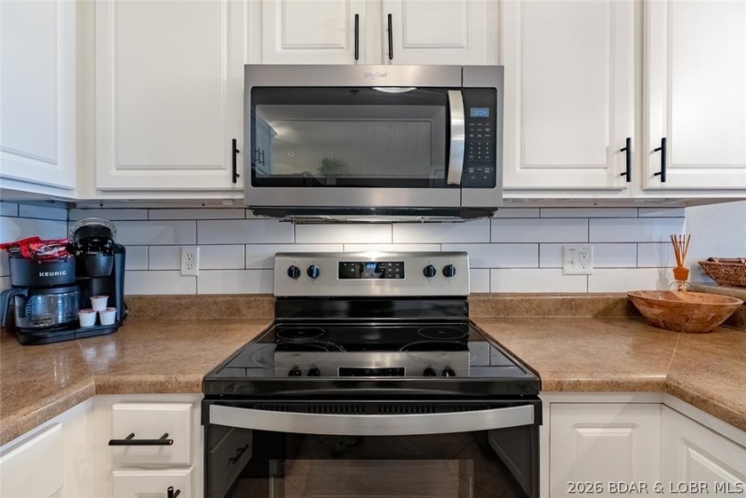 Enjoy large lake views and effortless access at this beautifully - photo 11