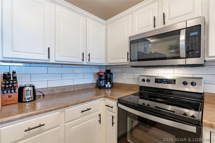 Enjoy large lake views and effortless access at this beautifully - photo 12