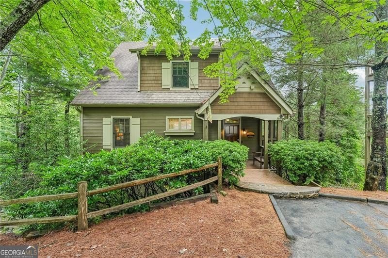 Nestled in the highly sought-after Laurel Ridge neighborhood of - photo 2
