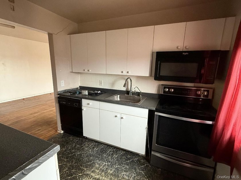 2 Bedroom UPPER Unit> Needs TLC> SOLD AS IS >Welcome to the - photo 7