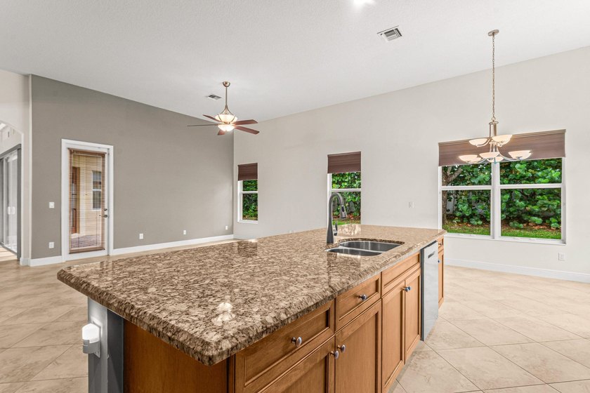 Welcome to this beautifully maintained 4-bedroom, 3-bathroom - photo 12
