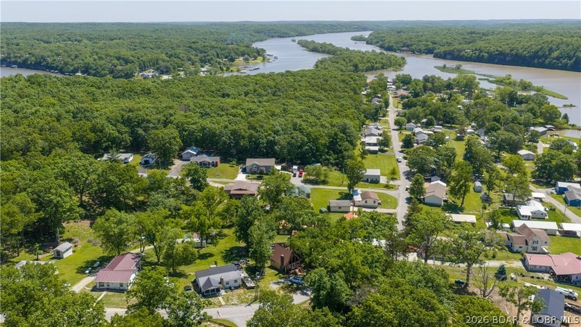 Tucked near the water in Warsaw, this 3-bedroom, 1-bath ranch - photo 28