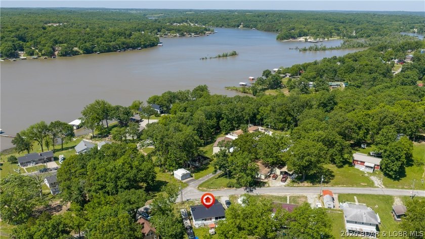 Tucked near the water in Warsaw, this 3-bedroom, 1-bath ranch - photo 29