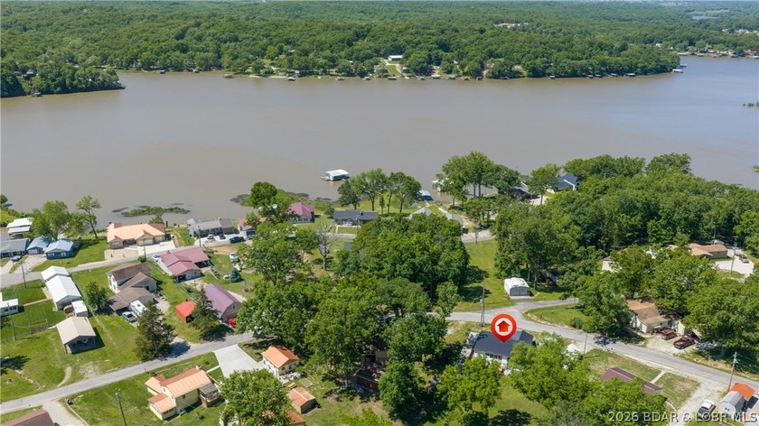 Tucked near the water in Warsaw, this 3-bedroom, 1-bath ranch - photo 33