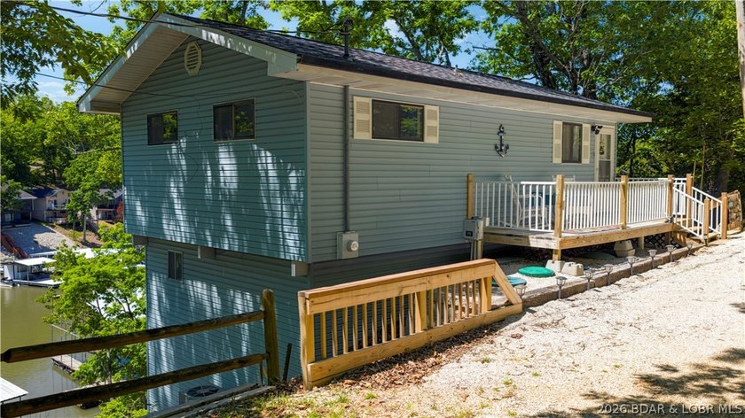 Tucked along a quiet cove at the 3 MM, 131 Walnut Drive is the - photo 27