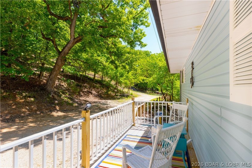 Tucked along a quiet cove at the 3 MM, 131 Walnut Drive is the - photo 28