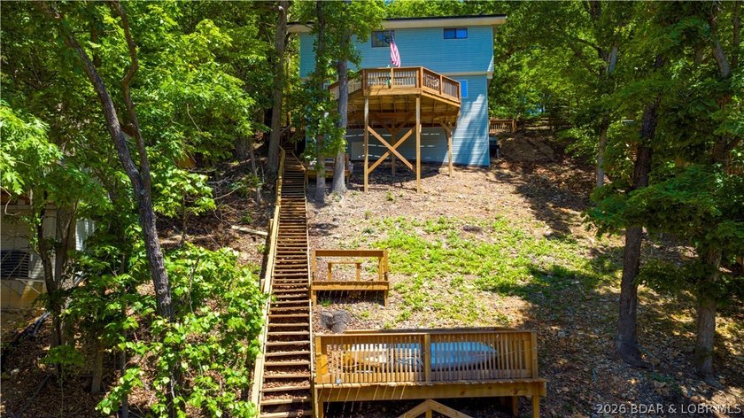 Tucked along a quiet cove at the 3 MM, 131 Walnut Drive is the - photo 31