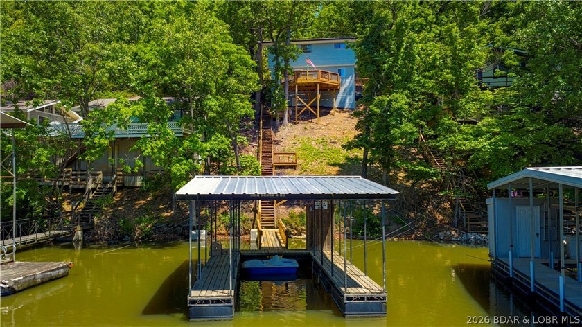 Tucked along a quiet cove at the 3 MM, 131 Walnut Drive is the - photo 33