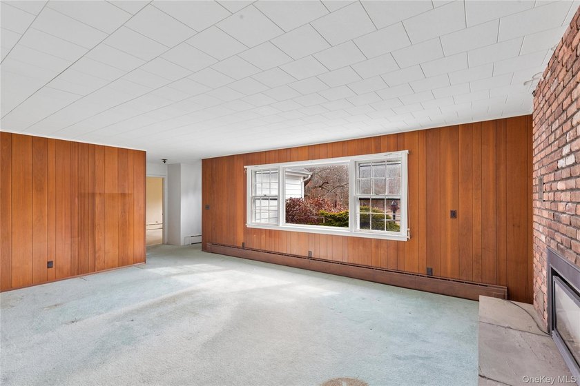 Located in the Rampasture Point section of Hampton Bays, this - photo 5