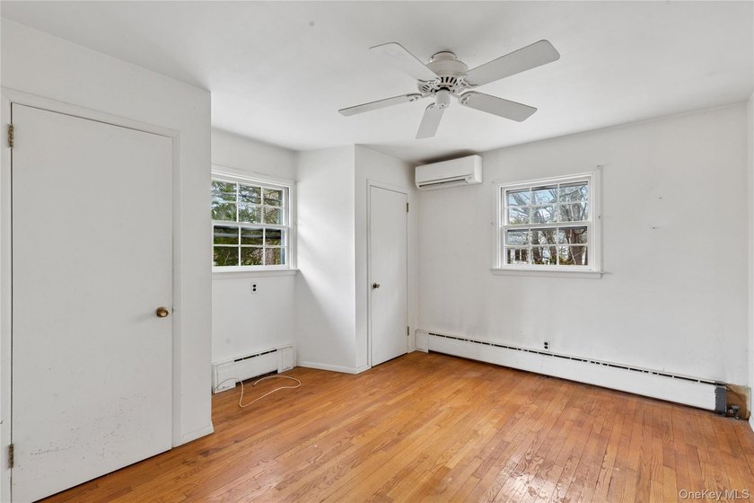 Located in the Rampasture Point section of Hampton Bays, this - photo 8