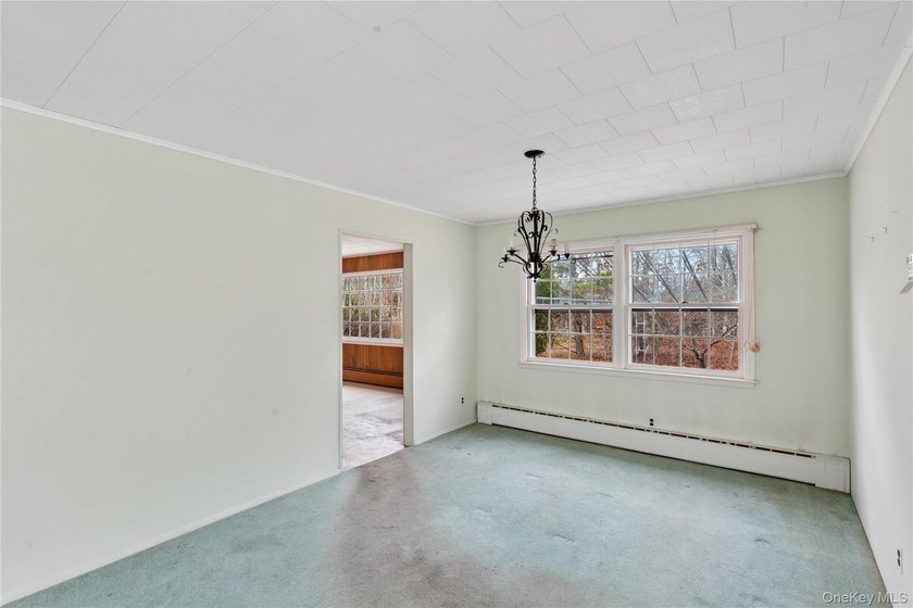 Located in the Rampasture Point section of Hampton Bays, this - photo 9
