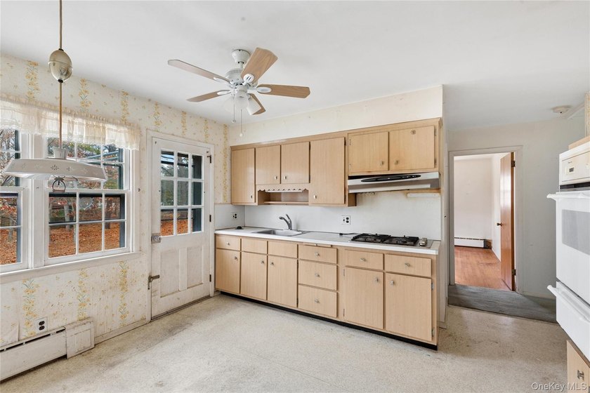 Located in the Rampasture Point section of Hampton Bays, this - photo 10