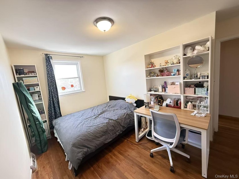 a well-maintained brick townhouse. This residence offers a solid - photo 2