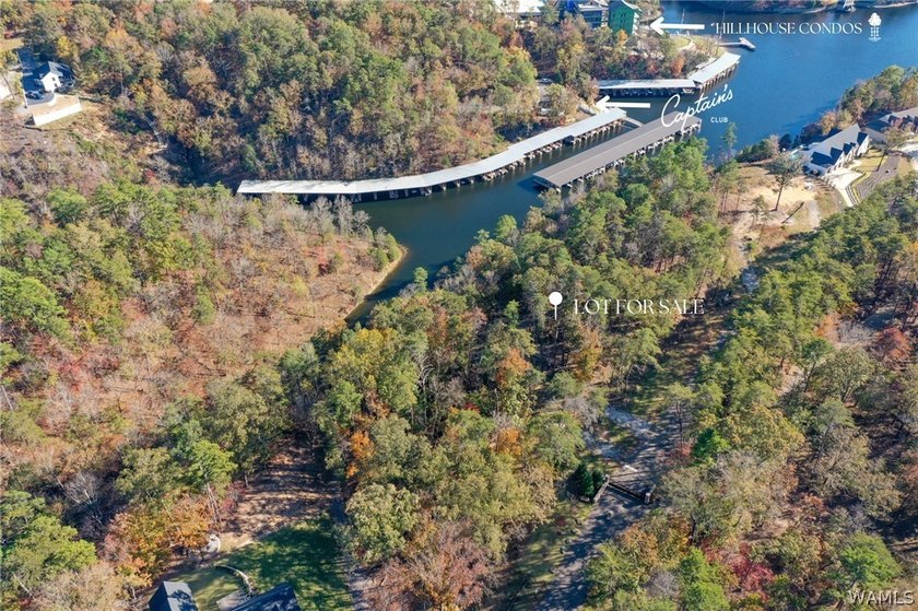 Discover a rare opportunity to own 1.21 +/- acres of lakefront - photo 7