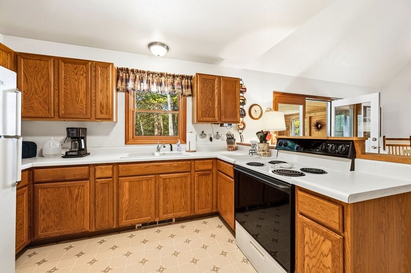Tucked away in the woods and just a short walk from deeded water - photo 11