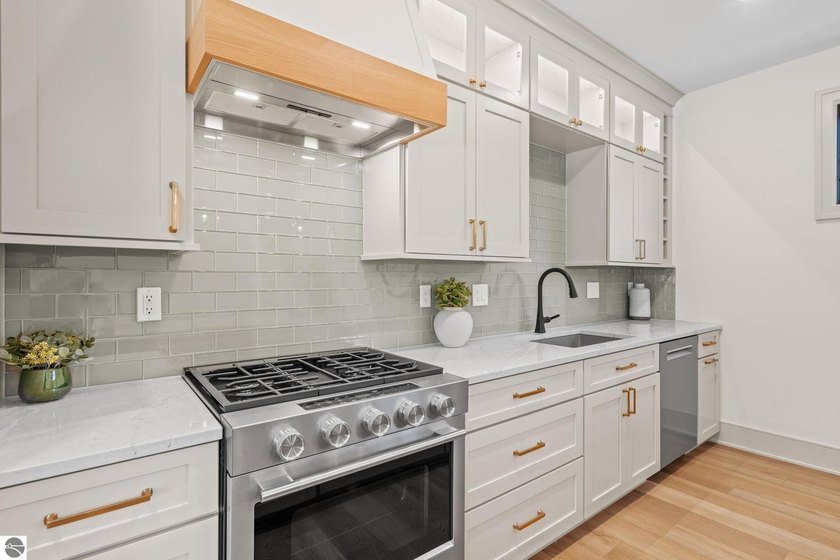 Experience elevated luxury in this brand-new, ground-floor condo - photo 12