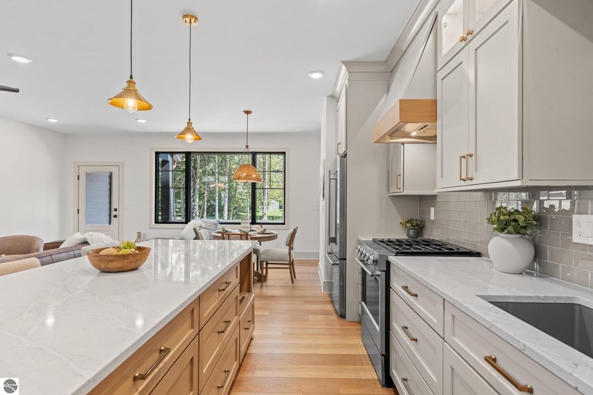 Experience elevated luxury in this brand-new, ground-floor condo - photo 13