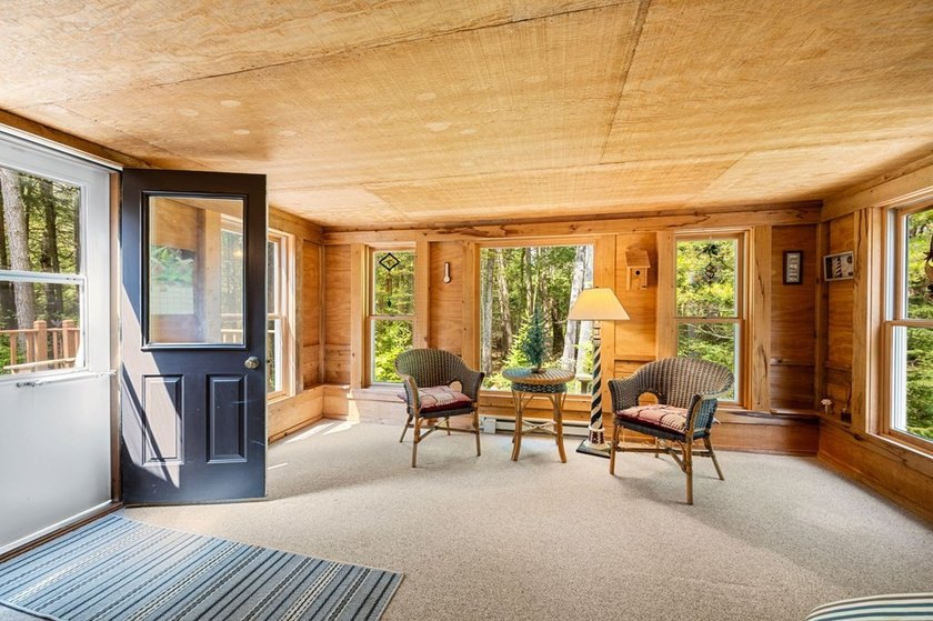 Tucked away in the woods and just a short walk from deeded water - photo 14