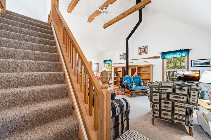 Tucked away in the woods and just a short walk from deeded water - photo 20