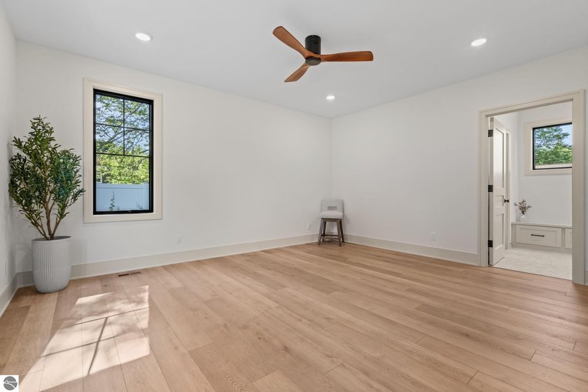 Experience elevated luxury in this brand-new, ground-floor condo - photo 23